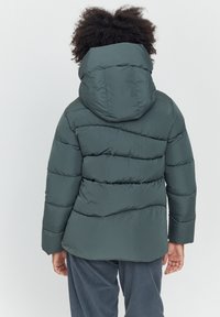 Dark green puffer jacket with a hood, featuring quilted sections and a smooth, glossy texture. Back view shows slightly cinched bottom.
