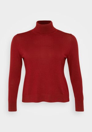 Κόκκινο πουλόβερ με ζιβάγκο από ραμμένο ύφασμα, με μακριά μανίκια και εφαρμοστή σιλουέτα. Το στρίφωμα είναι ίσιο, χωρίς πρόσθετα σχέδια ή λεπτομέρειες.