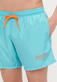 MOSCHINO SWIM SHORT BOXER - Peldēšanas šorti - light blue