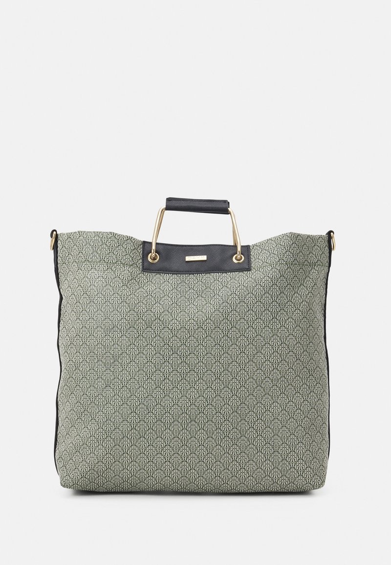 Duża torba typu tote z teksturowanej zielonej tkaniny z geometrycznym wzorem. Czarnie skórzane akcenty oraz solidne złote detale. Podwójne uchwyty u góry.