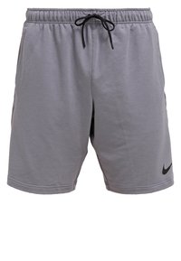 Shorts de sport gris avec taille élastique, cordon noir, poches latérales et petit logo Nike Swoosh noir sur la jambe gauche.