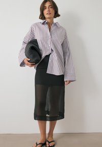 SHEER  - Falda acampanada - black