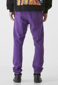 9N1M SENSE ESSENTIAL - Träningsbyxor - purple