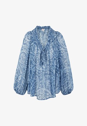 Blouse à manches longues à motifs bleus avec col à volants et fermeture par lien, dotée de manches bouffantes et d'un tissu léger et semi-transparent.