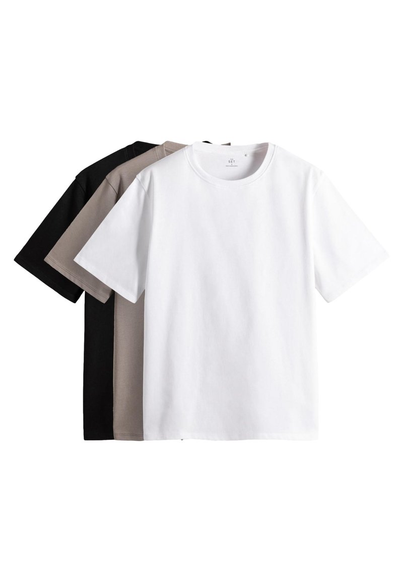 Zestaw trzech T-shirtów z okrągłym dekoltem w kolorach białym, beżowym i czarnym. Wykonane z miękkiej bawełny, z krótkimi rękawami i standardowym krojem.