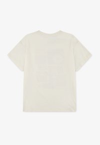 Cream-colored cotton t-shirt with short sleeves and a round neck, featuring a subtle graphic print on the back. Smooth texture.