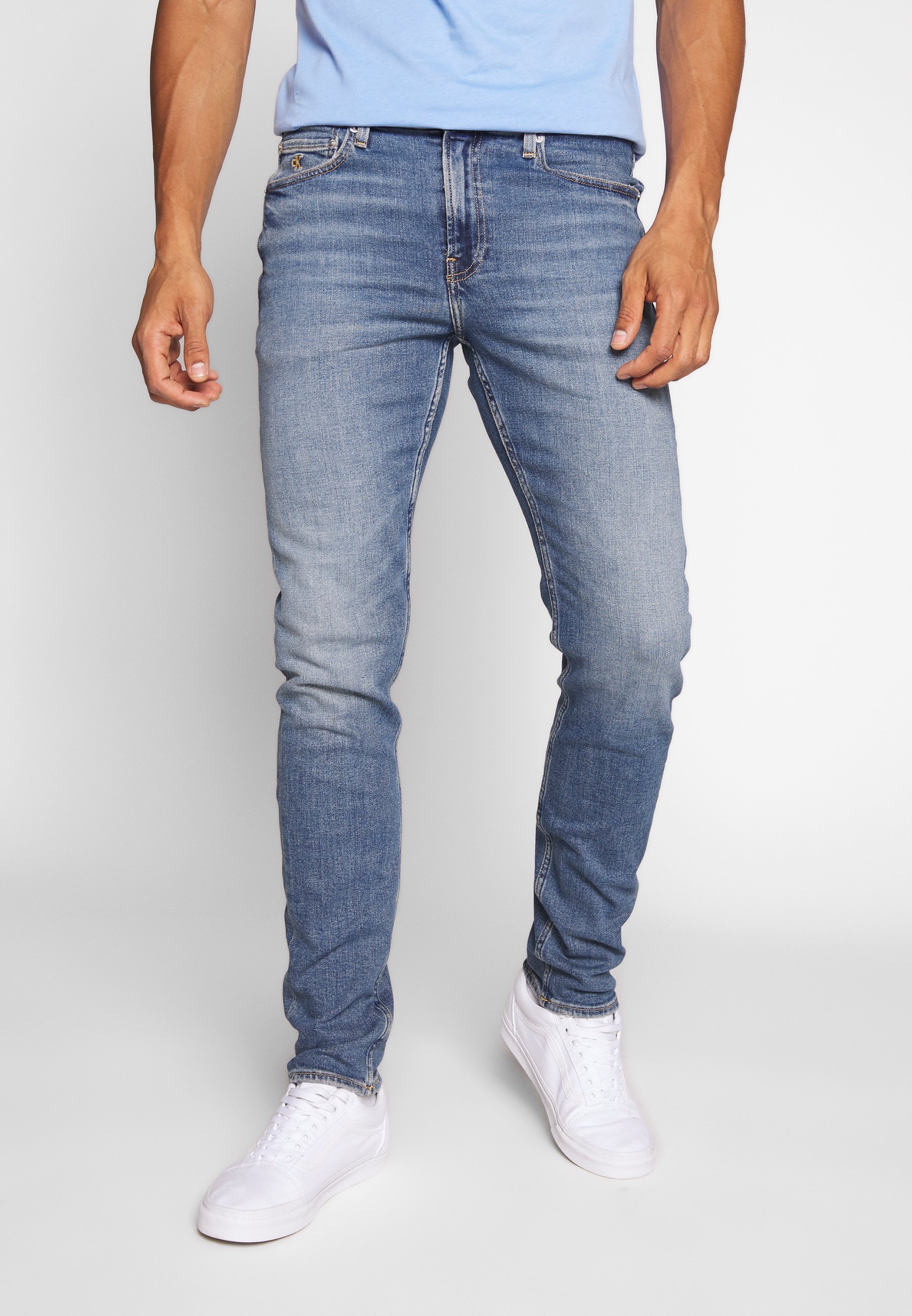 Calvin Klein Jeans SLIM TAPER - Slim fit jeans - dark blue/dark-blue denim  