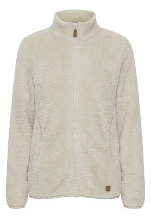 Giacca in fleece beige chiaro con colletto alto, zip completa, due tasche laterali e superficie testurizzata. Presenta un piccolo logo marrone.
