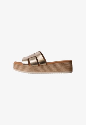 Metallic gold slide sandal with woven platform sole and three wide straps across the top for foot support and style.