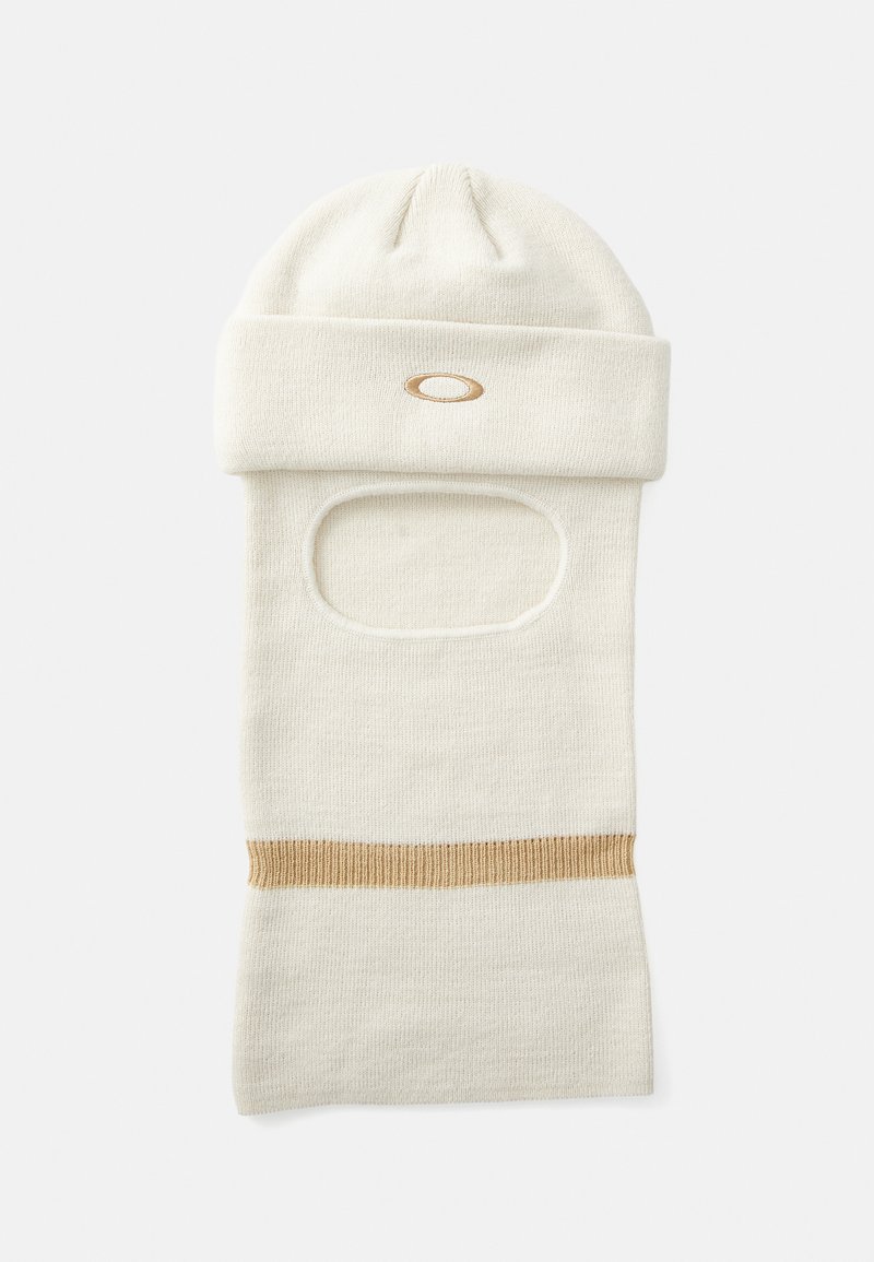 Balaclava en tricot blanche avec une découpe pour le visage, ornée d'un logo doré et d'un détail de bande brune à la base. Texture douce, ajustement confortable.