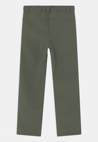 Vihreät, joustavat, pehmeät kankaiset housut, joissa on rento malli, sileä vyötärö ja suorat lahkeet. Taskuja ei ole näkyvissä.