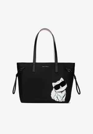 Borsa tote nera con manici lunghi e un gatto bianco con occhiali da sole neri stampato nell'angolo in basso a destra.