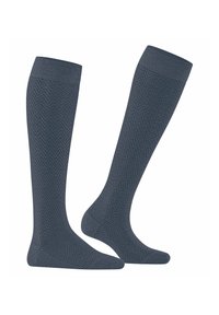 Calzini fino al ginocchio di colore blu scuro con motivo a spina di pesce, realizzati in un tessuto morbido e testurizzato. Presentano punta e tallone rinforzati.