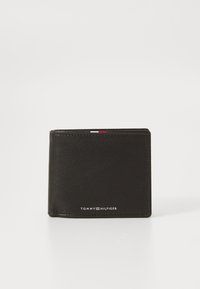 Black leather wallet with a textured finish, bi-fold design, featuring a branded logo and a small tri-color accent on the top edge.
