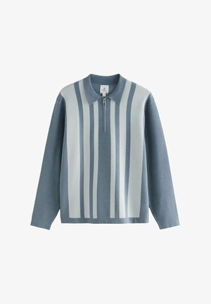 Hellblauer Pullover mit Reißverschluss, kurzem Kragen und vertikalen weißen Streifen. Aus weichem Material mit lässigem Schnitt.