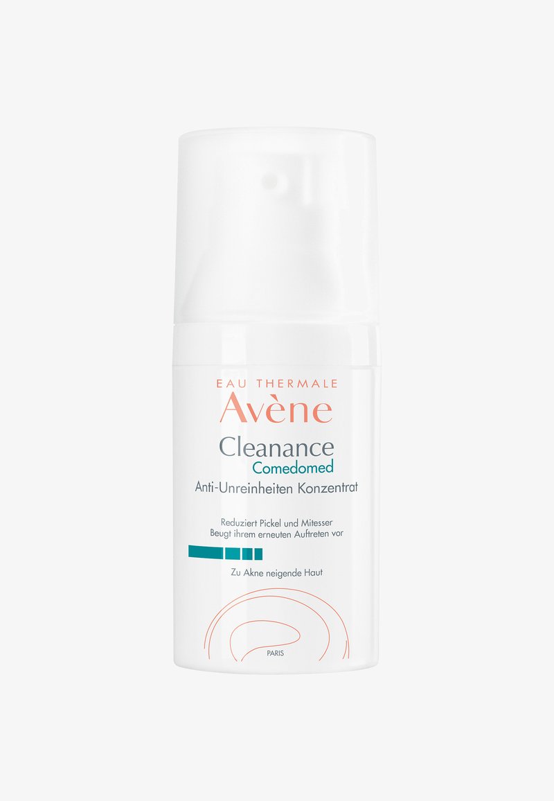 White plastic bottle with a pump dispenser, labeled "Avène Cleanance Comedomed," features teal and light orange text and simple graphics.