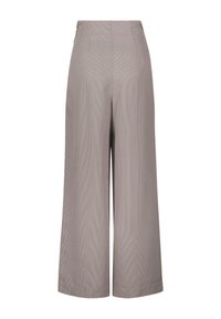 Pantalons larges à motif écossais, en tissu tissé, avec une taille haute et des plis avant, dans des teintes de marron clair et beige.