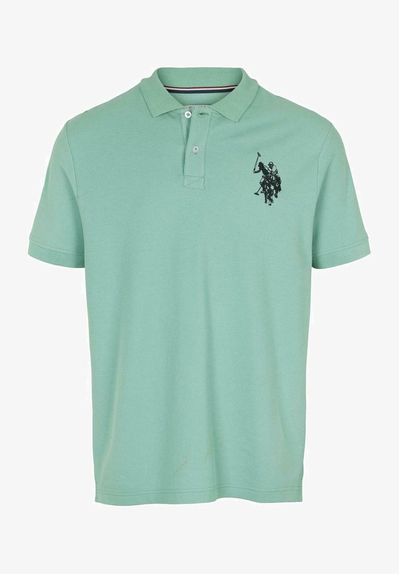 Polo vert menthe à manches courtes avec col et deux boutons, avec un logo joueur de polo noir brodé sur la poitrine gauche.