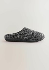 Grå og sort struktureret filt-sko med en polstret sål og en sort gummisål, der har et slip-on design og en rund form.
