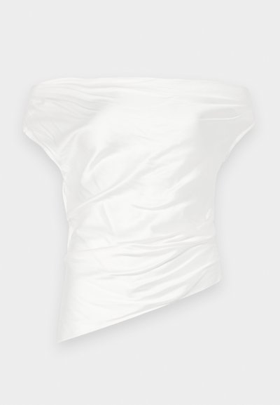 White off-the-shoulder top made of smooth satin fabric, featuring draped, structured design with an asymmetrical hemline.
