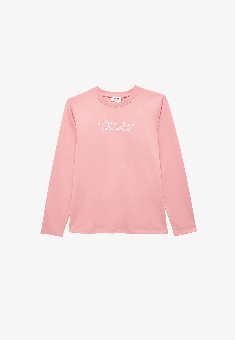 Rosa långärmad T-shirt i mjukt tyg, med vit text som säger "La plus douce étoile d'hiver" med en stjärndekoration.