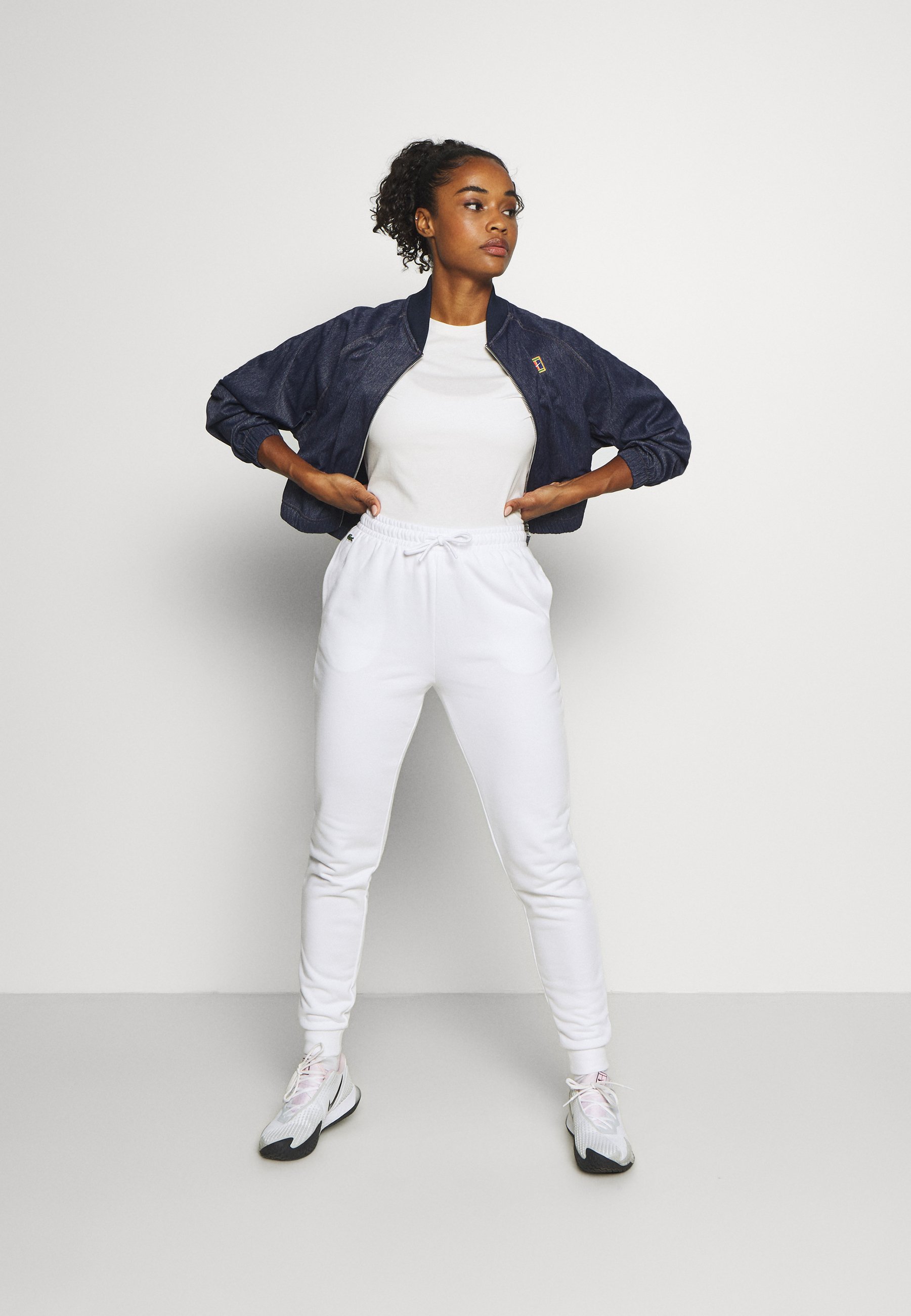 white lacoste joggers