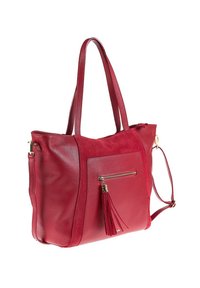 Borsa a tracolla in pelle rossa con doppio manico, tasca frontale con zip e dettaglio decorativo con nappina, angolata per mostrare le viste laterale e frontale.