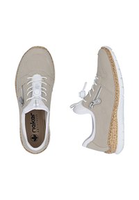 Beige synthetic shoes with a textured finish, white accents, decorative zip detail, and a cork-like sole. Rounded toe and lace-up design.