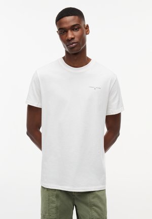 Tommy Jeans LINEAR LOGO CREW NECK - Lihtne T-särk - ecru