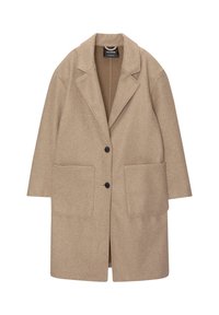 Abrigo de lana beige con solapa muesca, dos grandes bolsillos frontales y cierre de botón único. Textura suave y diseño de corte holgado.