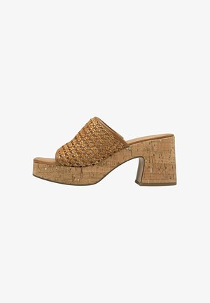 Tige en ton naturel tissé, bout ouvert, talon en liège avec finition texturée, forme arrondie et hauteur modérée pour la stabilité.