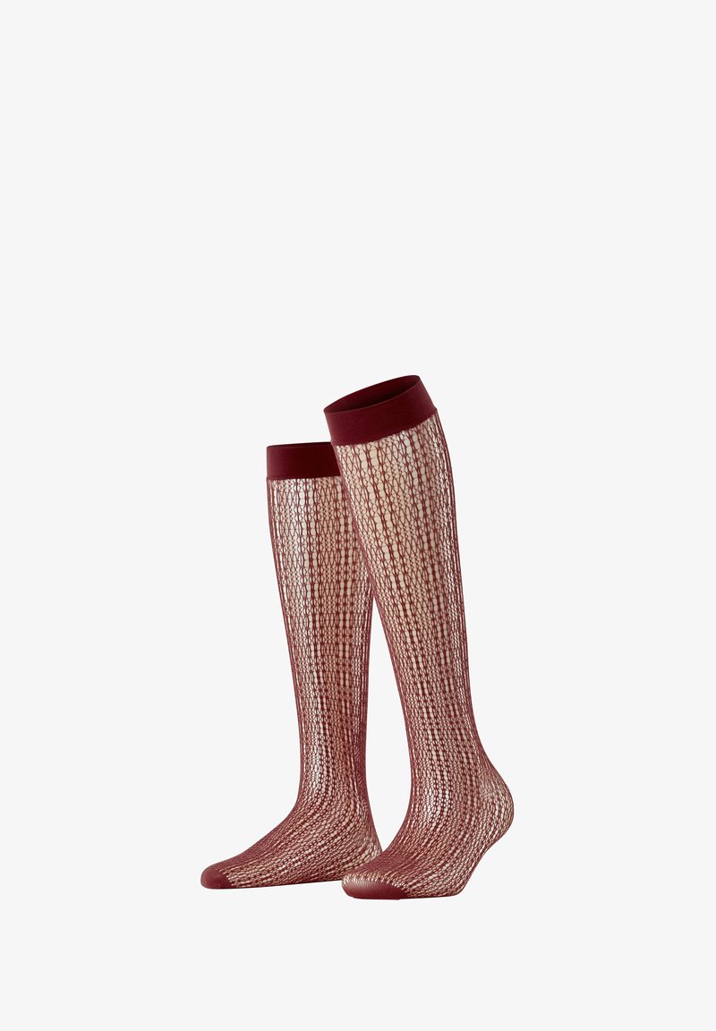 Kolorowe podkolanówki w kolorze bordowym z wzorzystym, półprzezroczystym wzorem oraz jednolitymi ciemnymi paskami na górze i wokół kostki.