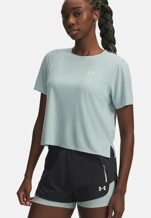 Light blue short-sleeve athletic top with a loose fit, paired with black shorts featuring a logo and side pockets, made of breathable material.