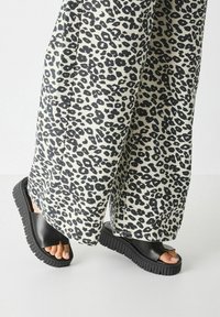Tamaris Heeled mules - black