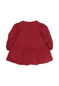 Abito di cotone rosso con maniche lunghe a palloncino, scollatura rotonda e gonna arricciata con chiusura lampo sul retro. Tessuto morbido e design semplice.