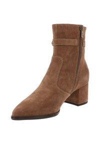 Stivale alla caviglia in suede beige con punta affilata, cerniera laterale e tacco a blocco. La texture liscia e il design minimalista presentano un dettaglio a strappo.