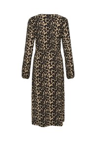 Robe mi-longue à imprimé léopard avec des manches longues, un col rond et une taille élastiquée. Fabriquée en tissu doux et texturé.