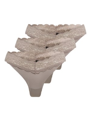 Woman wearing matching gray lace bra and panties, standing barefoot with one leg slightly forward on plain white background.