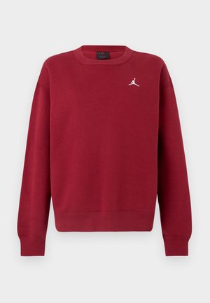 Sudadera roja con mangas largas, puños y dobladillo acanalados, con un logo blanco en el pecho. Hecha de material de algodón suave.