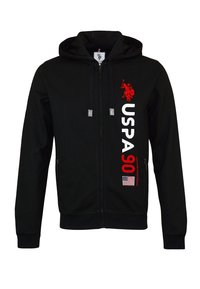 Felpa nera con zip, con logo di un cavallo rosso e la scritta "USPA 90" stampata in bianco. Presenta un cappuccio con coulisse e tasche laterali.