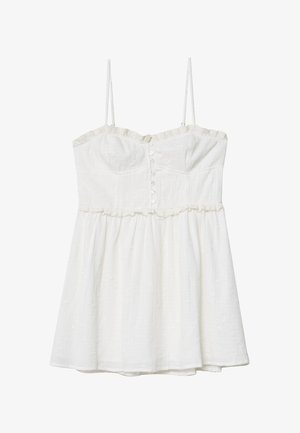 Bijela pamučna haljina sa trakama za rame, volanom na izrezu, zatvaranjem na dugmad i teksturiranim materijalom. Do koljena je i ima prošireni siluetu.