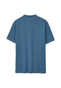 T-shirt di cotone blu con maniche corte, collo a giro e una superficie liscia; nessun design o dettaglio visibile sulla schiena.