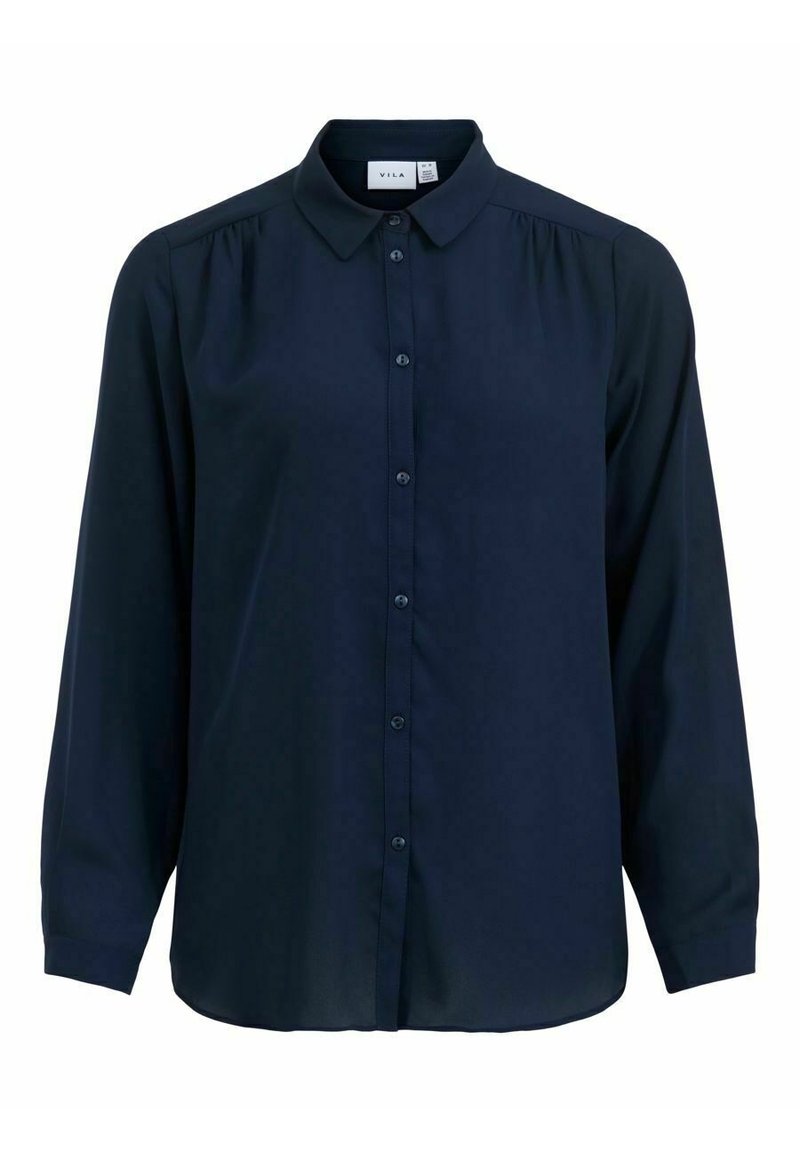 Chemise bleu marine à boutons en tissu léger, dotée de manches longues, d'un col classique et de plis subtils près des épaules.