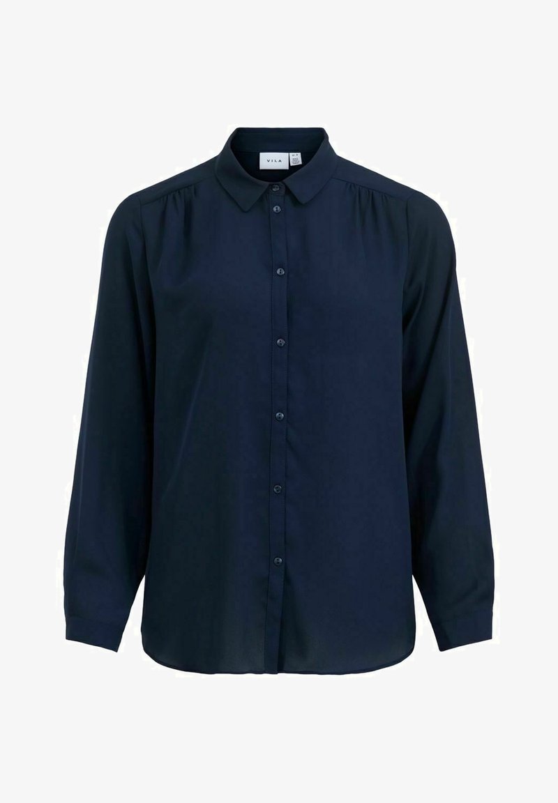 Chemise bleu marine à boutons en tissu léger, dotée de manches longues, d'un col classique et de plis subtils près des épaules.