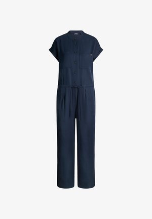 Marineblauw korte mouwen jumpsuit met knoopsluiting aan de voorkant, borstzakken, een taillekoord en brede pijpen.