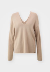 Beiger V-Ausschnitt-Pullover mit langen Ärmeln, strukturiertem Stoff, lockerer Passform und einem kleinen Logo-Akzent am unteren Saum.