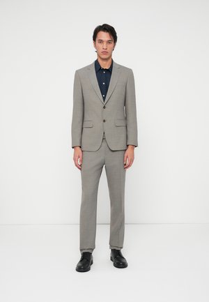 HUGE  - Kostymkavaj - dark beige