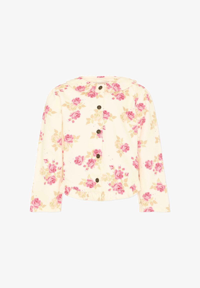 Blouse crème à manches longues avec imprimés de roses roses et beiges, boutons marron sur le devant, et large col rond.