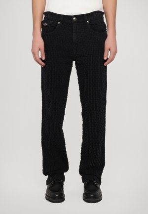 SLOUCHY - Jeans fuselé - black