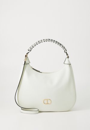 Borsa a tracolla in pelle verde chiaro con una maniglia a spirale unica nera e bianca, hardware dorato e un semplice logo accento nella parte anteriore.